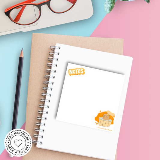 Notepad with a cartoon capybara in a hot tub and 'Notes' text on a white background.