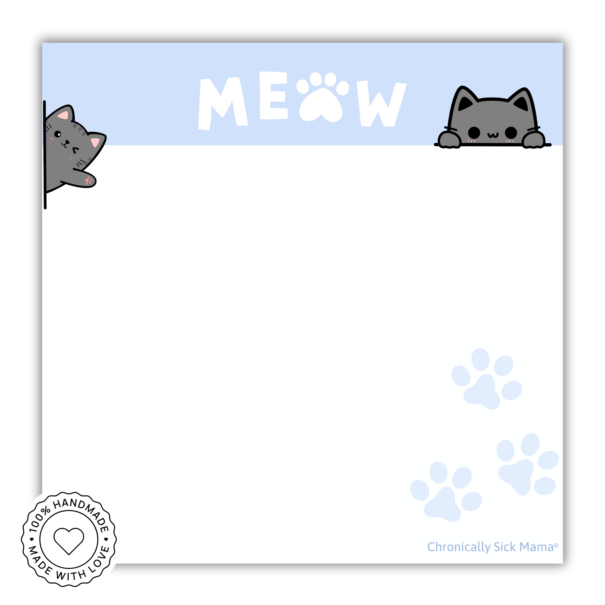 Notepad with cartoon cats and 'MEOW' text on a light blue background