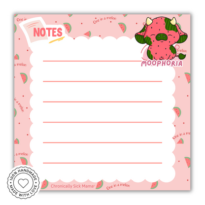 Notebook with watermelon-themed  cow design and Moophoria branding on a pink background.