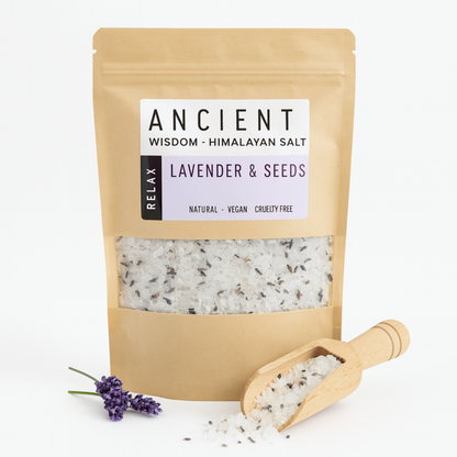 Bag of Himalayan salt with lavender and seeds, labeled 'Ancient Wisdom', on a white background.